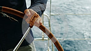 Sailor`s point of view. Sailboat floating on an open sea