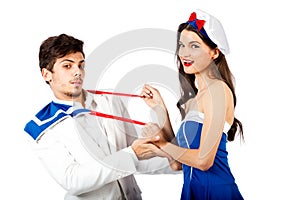 sailor woman seducing elegant young man