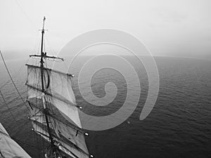 Sailors aloft in the open ocean