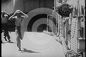 Sailors lined up to pass ammunition