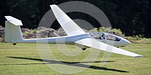 Sailplane landing on an airfield