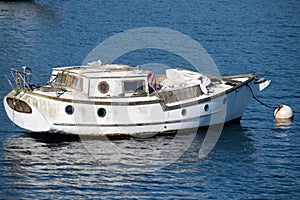 Sailsboat on mooring buoy
