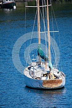 Sailsboat on mooring buoy