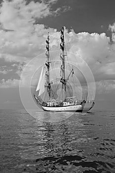 Sailship brig sailing under full sails