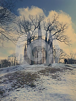 Saint Alexander Nevsky Orthodox church Gothic chapel in Alexandria park. Suburb of Saint Petersburg, Russia