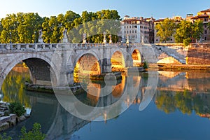 Saint Angel bridge at sunrise, Rome, Italy.