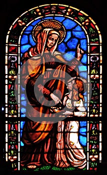 Saint Anne, stained glass window in the Santi Paolino e Donato church in Lucca, Italy