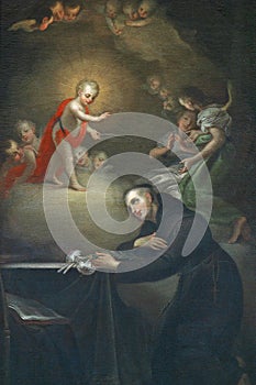 Saint Anthony adores baby Jesus photo