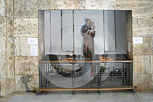 Saint Anthony holds a child of Jesus, a statue in the church of Saint Anthony of Padua in Zagreb, Croatia