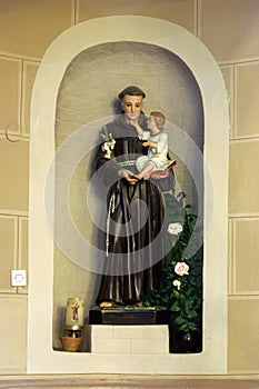 Saint Anthony of Padua holding child Jesus, statue in the church of St Peter in Ivanic Grad, Croatia