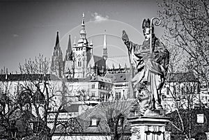 Saint Augustin statue, Charles Bridge and Prague castle