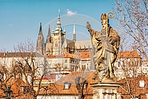 Saint Augustin statue, Charles Bridge and Prague castle