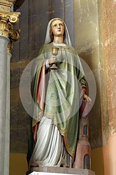 Saint Barbara, statue on the altar of Saints Fabian and Sebastian in the church of the Assumption of the Virgin Mary in Zlatar, photo