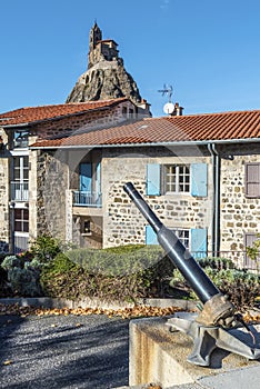 Saint Clair square in Aiguilhe commune, the famous Saint-Michel d Aiguilhe rock is at background. Le Puy-en-Velay in Haute-Loir