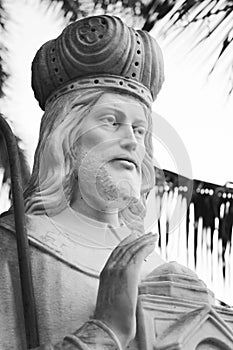 Saint Coleman White Stone Religious Figure in the Courtyard