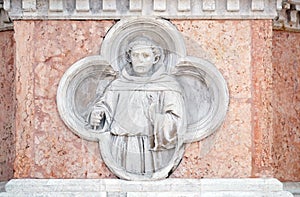 Saint Francis by Paolo di Bonaiuto relief on facade of the San Petronio Basilica in Bologna