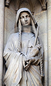 Saint Genevieve, statue on the portal of the Basilica of Saint Clotilde in Paris