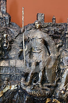 Saint George, bas relief in Chapel of Saint Dismas in Zagreb, Croatia photo