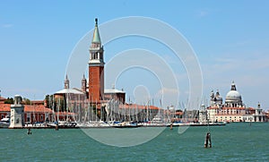 Saint George Church with many boats moored on the harbor on the