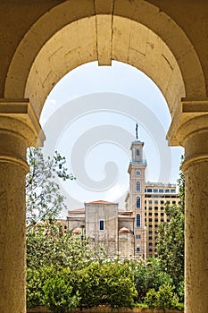 Saint Georges Maronite cathedral framed by an arch in downtown Beirut Central District, Lebanon