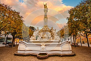 Saint Georgs fountain in Trier, Germany at autumn morning photo