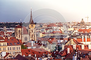 Saint Giles` Church and Prague cityscape. Czech Republic