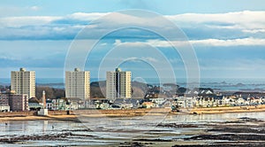 Saint Helier capital city panorama with buildings and residential houses on the La Manche seashore, in low tide, bailiwick of