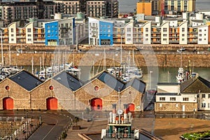 Saint Helier capital city with port, marina and residential distict in the backgound, bailiwick of Jersey, Channel Islands