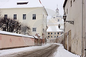 Saint ignatius street in winter oldtown Vilnius