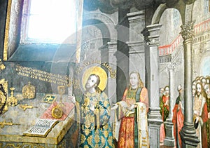 Saint John Chrysostom serves the Divine Liturgy. Painting photo