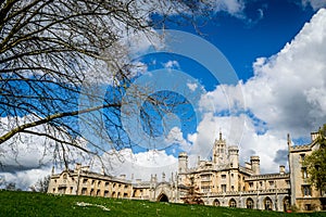 Saint John College on a bright sunny day with patches of clouds over the blue sky, Cambridge