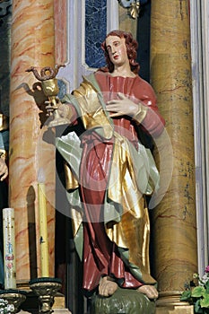 Saint John the Evangelist and Apostle, statue on the high altar in the Church of Our Lady of Dol in Dol, Croatia