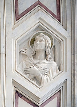 Saint John the Evangelist, relief on the facade of Basilica of Santa Croce in Florence