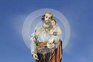 Saint Joseph and baby Jesus catholic image photo