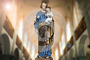 Saint Joseph and baby Jesus catholic image photo