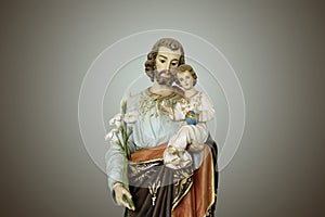 Saint Joseph and baby Jesus catholic image photo