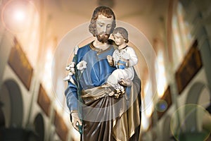 Saint Joseph and baby Jesus catholic image photo