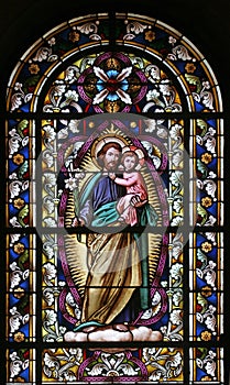 Saint Joseph with child Jesus photo