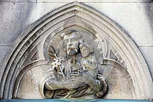 Saint Joseph holding child Jesus