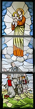 Saint Joseph, the patron saint of Croatia, stained glass window in the church of Saint Anthony of Padua in Lasinja, Croatia photo