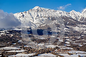Saint-Julien-en-Champsaur and Queyrel Peak in winter. France