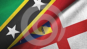 Saint Kitts and Nevis and Herm two flags textile cloth, fabric texture