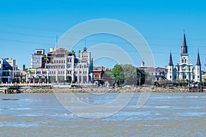 Saint Louis Cathedral and New Orleans skyline on a sunny day, Louisiana