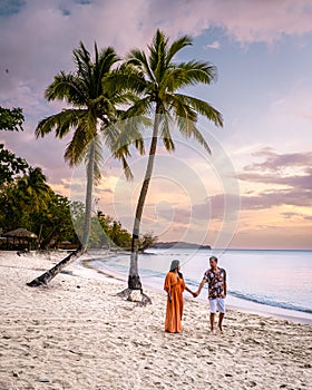 Saint Lucia Caribbean Island, couple on luxury vatation at the tropical Island of Saint Lucia, men and woman by the