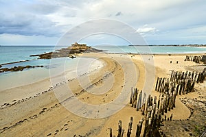 Saint Malo beach, Fort National and rocks during Low Tide. Britt