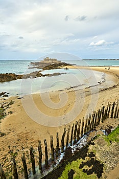 Saint Malo beach, Fort National and rocks during Low Tide. Britt