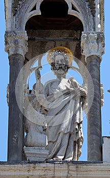 Saint Mark the Evangelist, marble statue, detail of the facade of the Saint Mark`s Basilica, Venice, Italy