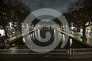 The Saint Martin canal at night during a rainy moment