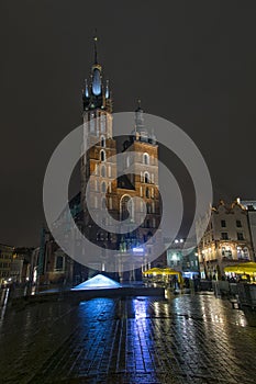 Saint Mary's Basilica at night in Krakow, Poland