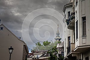 Saint Michael Cathedral, also known as Saborna Crkva, with its iconic clocktower seen from a street of Stari Grad district with